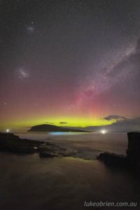 The southern lights with the Milky Way, Magellanic Clouds and a touch of bioluminescence