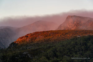Sunrise hits the cliffs of Crater Peak