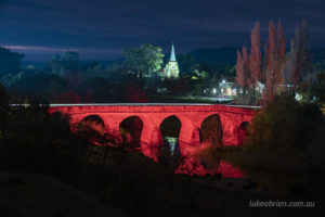 Richmond Bridge lt up in red for Dark Mofo