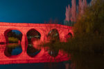 Richmond Bridge lit up in red for Dark Mofo