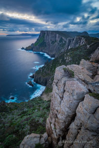 The Cape Pillar sea cliffs at blue hour.